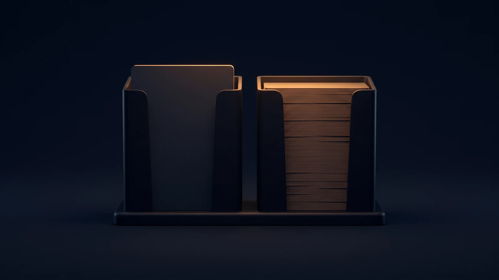 Two upright holders of dark matte glass standing shoulder to shoulder on one broad low base rail in a deep blue void, the left gripping a single blank card that is dark and rim-lit and the right gripping a thick stack of blank cards washed warm amber