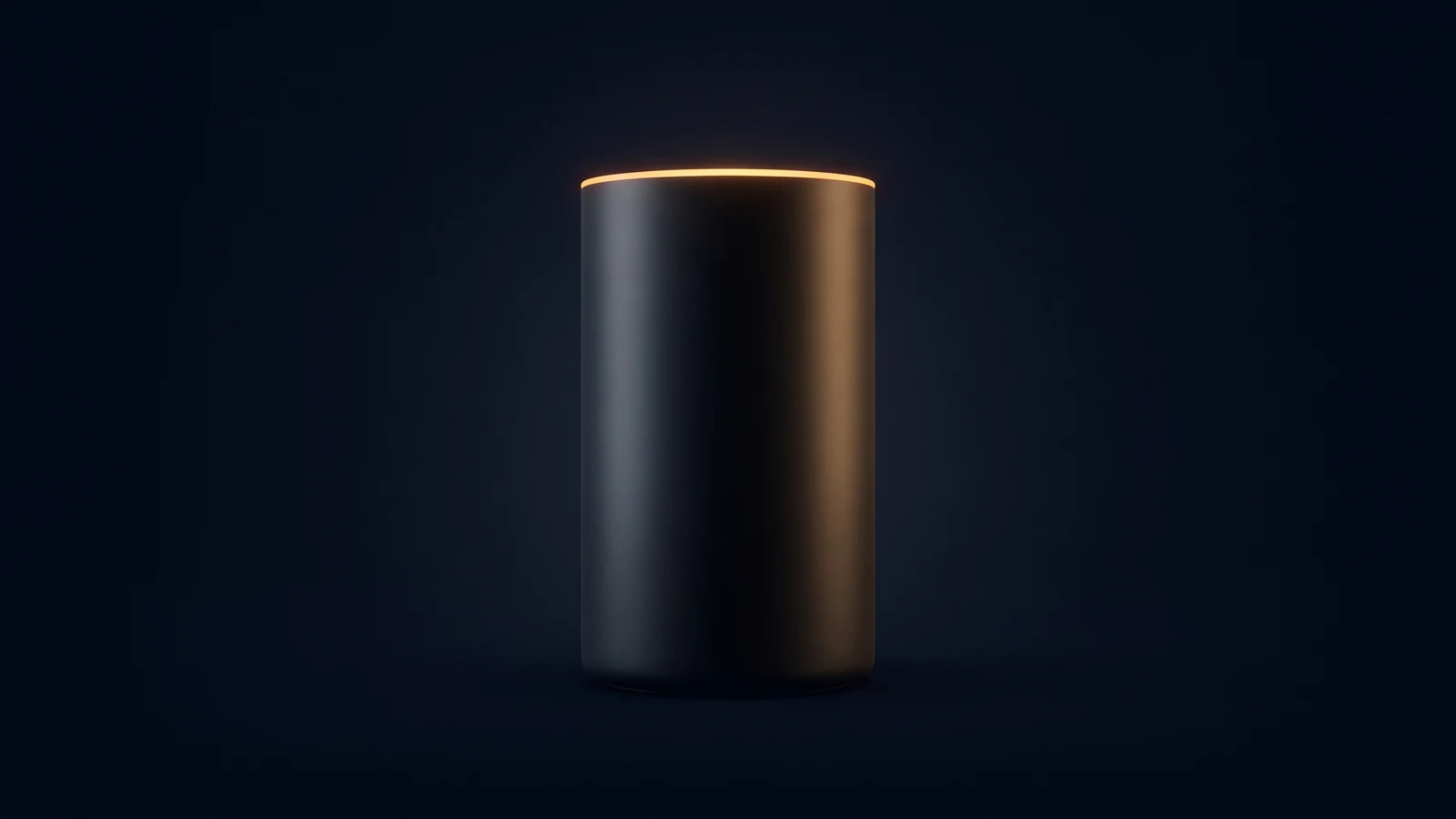 A squat cylindrical desktop speaker of matte near-black glass standing dead-on in a deep blue void, a narrow band around its top edge glowing warm amber