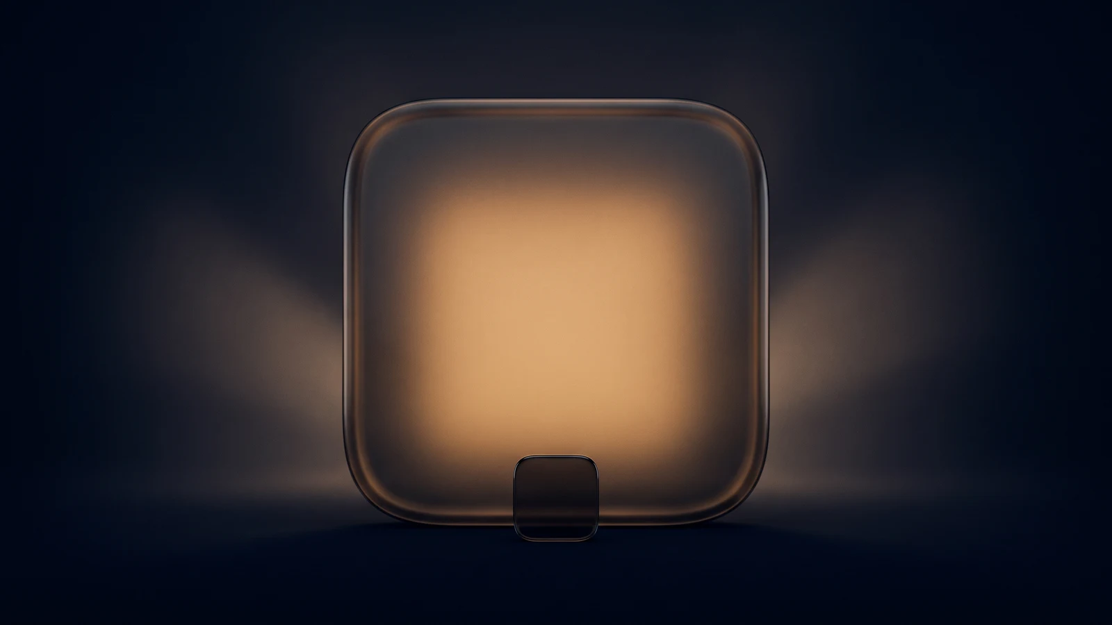 One oversized rounded-square tile of dark smoked glass standing upright in a deep blue void with its blank face glowing warm amber, a much smaller identical tile left dark at its base