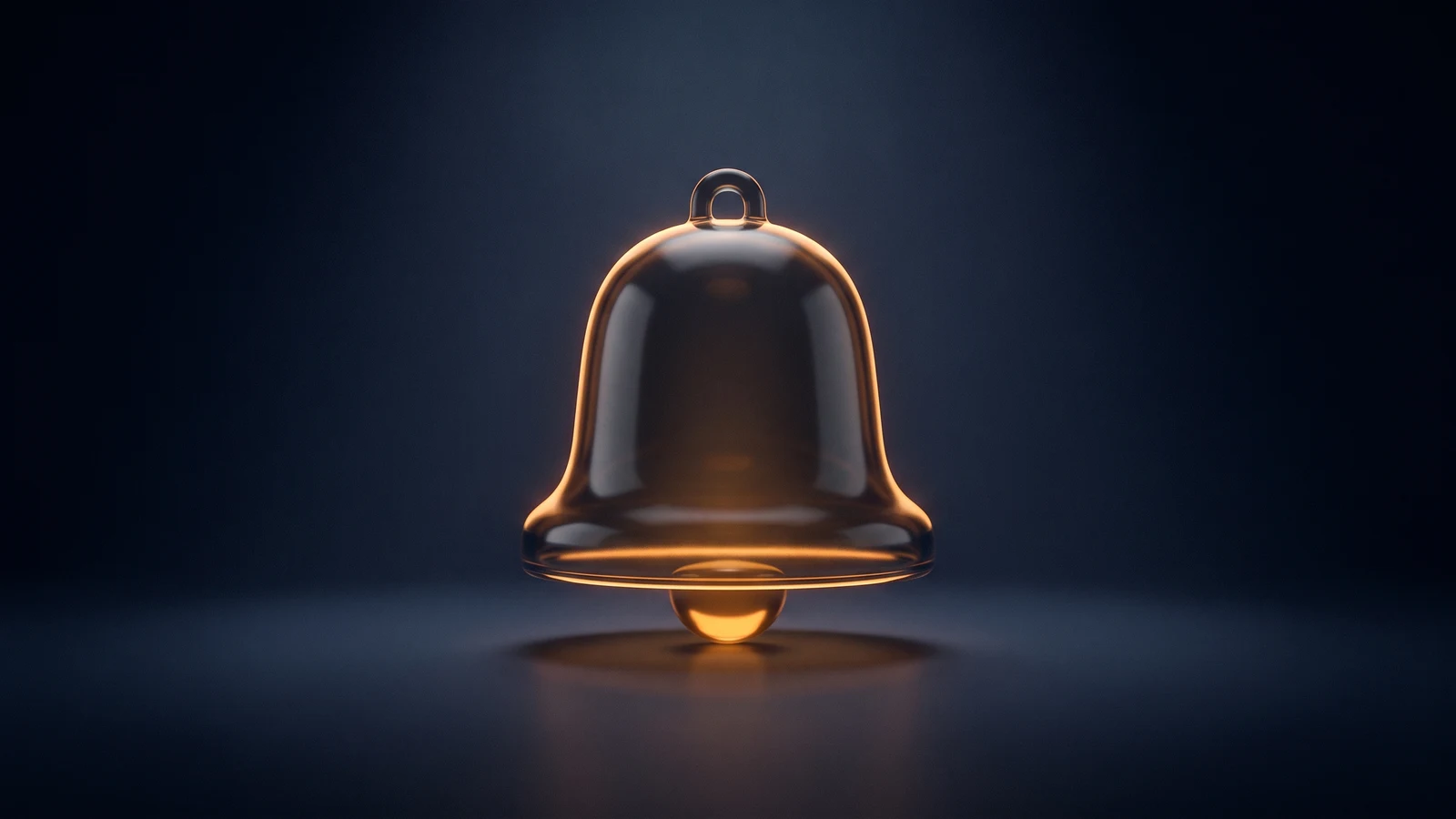 A single large notification bell of dark smoked glass standing upright in a deep blue void, its body and clapper glowing warm amber from within