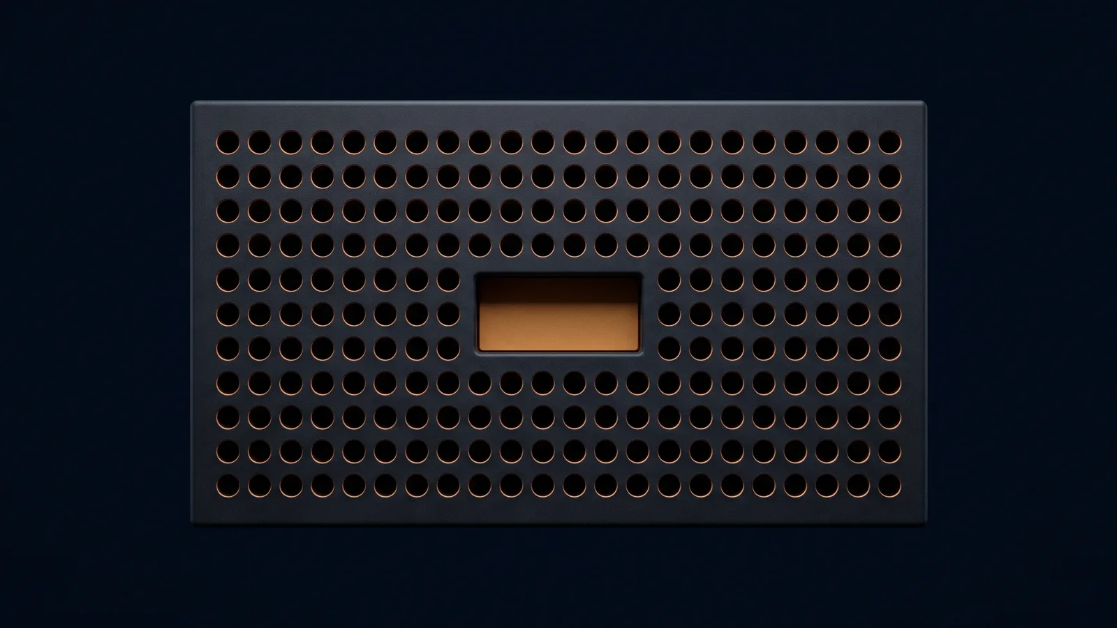 A broad blank plate of dark smoked charcoal in a deep blue void, its face an even field of many identical small empty round holes all dark, and one rectangular seat cut at the center holding a single unmarked piece washed warm amber
