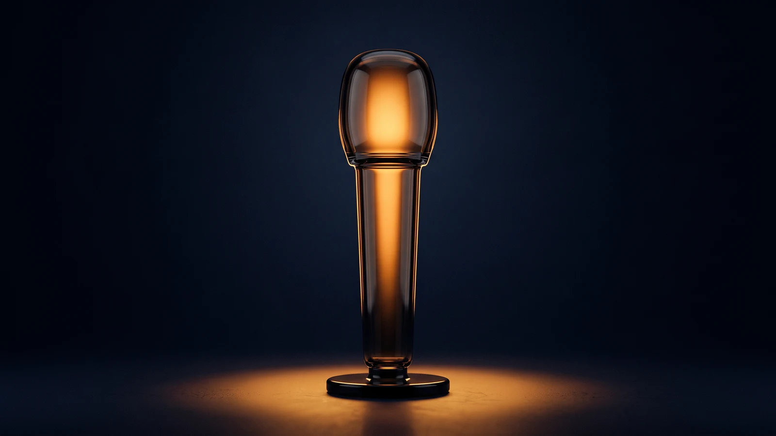 A single upright studio microphone of dark smoked glass on a round base, glowing warm amber from deep inside its head in a deep blue void