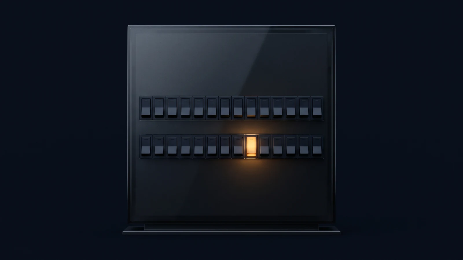 A broad upright breaker panel of dark smoked glass in a deep blue void, its blank face carrying two rows of identical plain rocker switches, all of them dark except one in the lower row thrown down and glowing warm amber