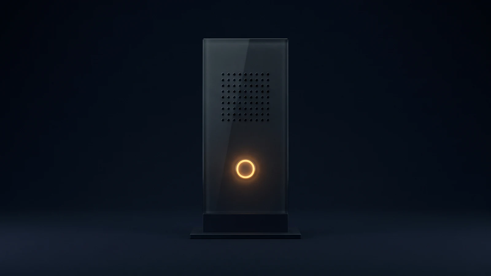 An upright blank door intercom panel of dark smoked glass standing on a low base in a deep blue void, one round button glowing warm amber, the perforations above it dark