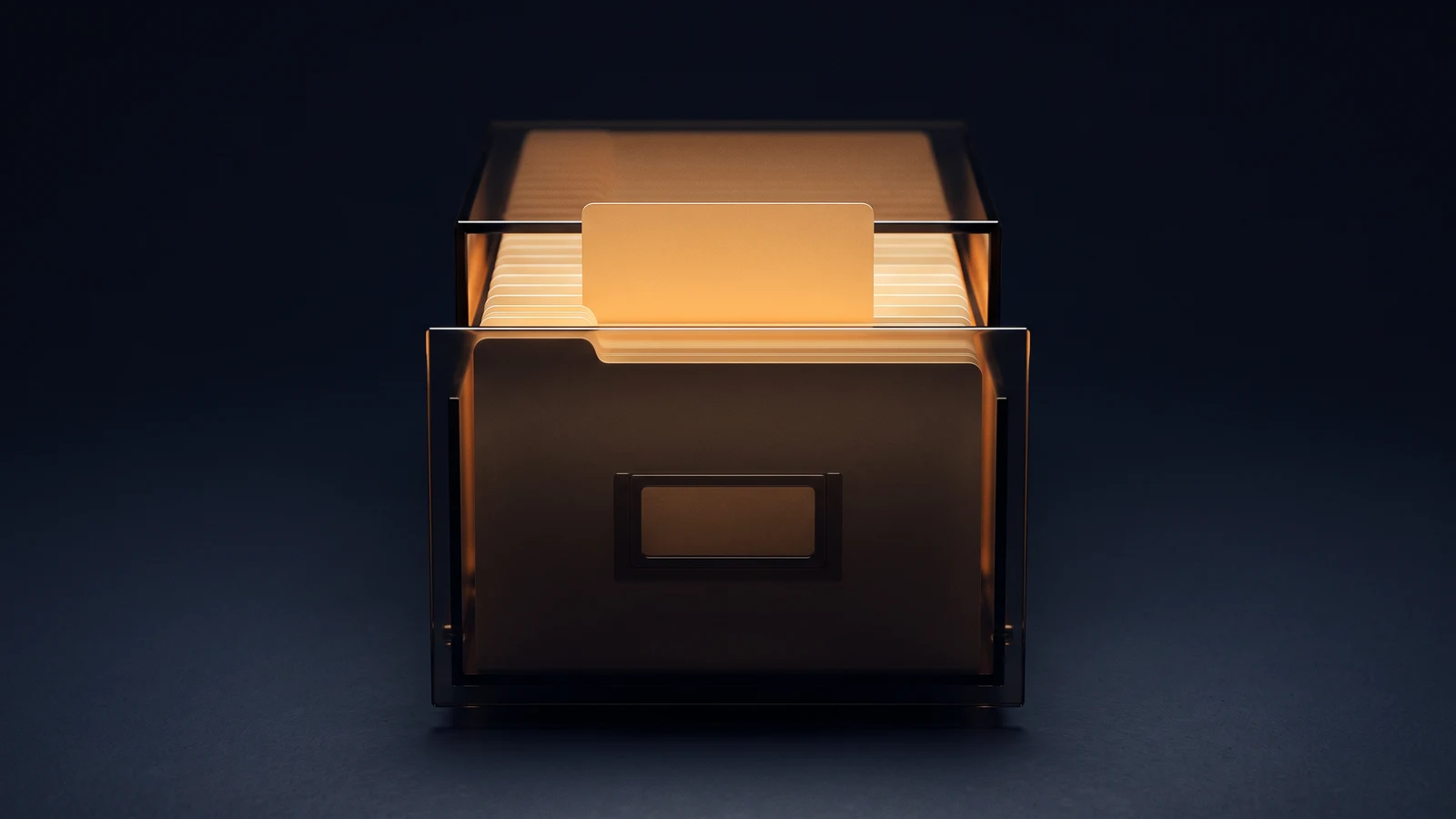 An upright index card drawer of dark smoked glass in a deep blue void, blank filing cards standing out of its open top with one raised center card glowing warm amber