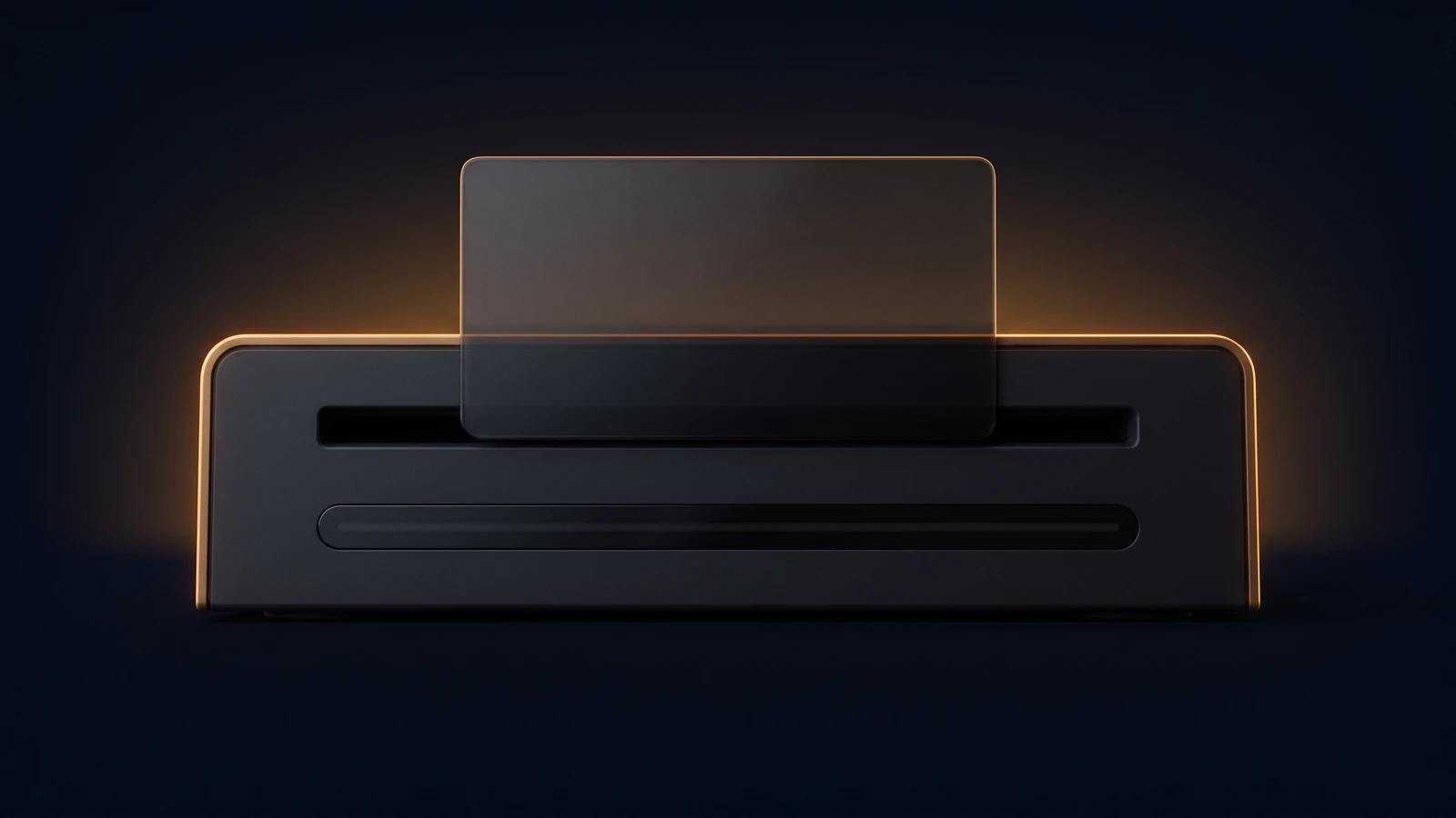 A broad dark desktop card reader with a warm amber rim in a deep blue void, one blank dark glass card pushed halfway into its front slot and a long status strip beneath the slot left unlit