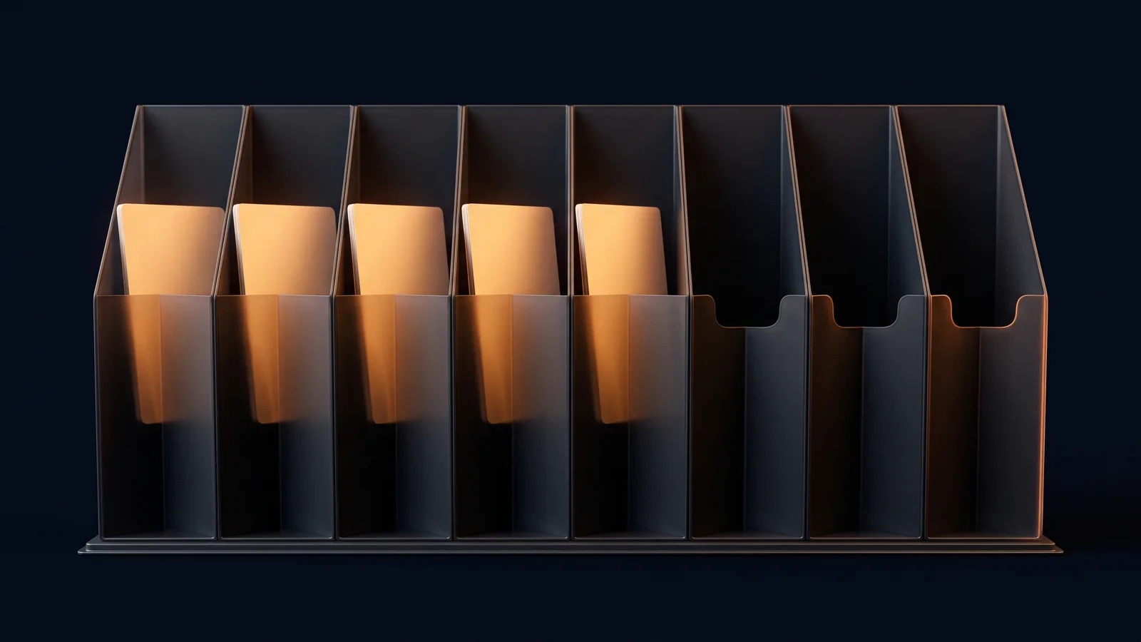 An upright file rack of dark smoked charcoal standing on a low base rail in a deep blue void, divided into eight tall unmarked pockets, the five on the left each holding a blank card lit warm amber and the three on the right standing empty and dark