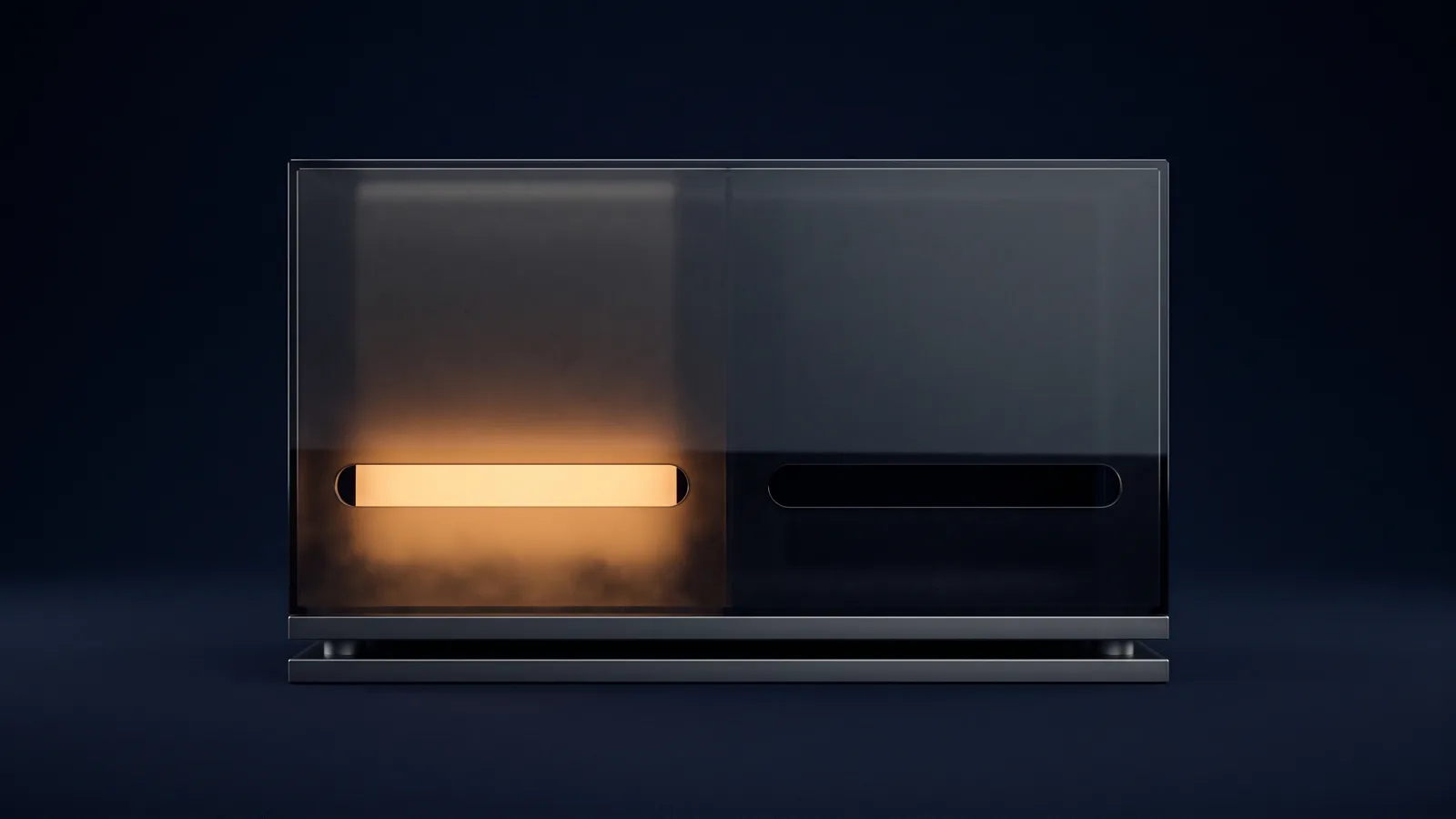 A broad dark smoked-glass housing standing dead-on on a low metal base rail in a deep blue void, its whole front face blank and unmarked, two identical wide horizontal output slots cut side by side across the lower half, the left slot pouring warm amber light out of the interior and the right slot completely dark but clearly present