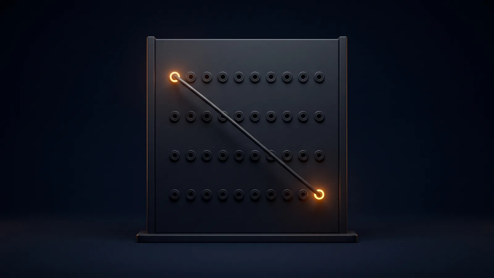 An upright switchboard patch panel of matte near-black glass standing dead-on on a low base in a deep blue void, four rows of blank round jack sockets across its face, one long cord running on a diagonal between a socket at the top left and one at the bottom right, only those two sockets glowing warm amber